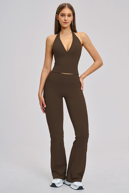 Women's athleisure set in brown: halter V-neck crop top with high-rise flared leggings.