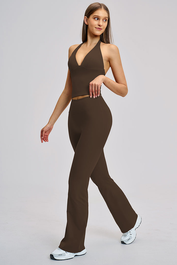 Women's two-piece athleisure workout set in dark brown: halter V-neck top and flared pants