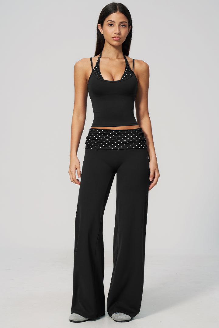 Black halter top and wide-leg pants set with white polka-dot ruched waist