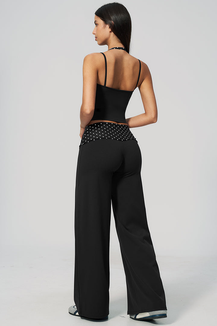 Black halter back and wide-leg pants with white polka-dot ruched waist panel
