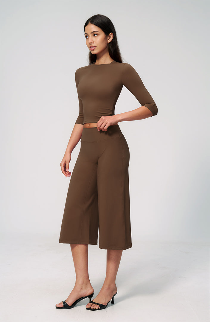 Brown fitted crop top and wide-leg capri pants set, front view