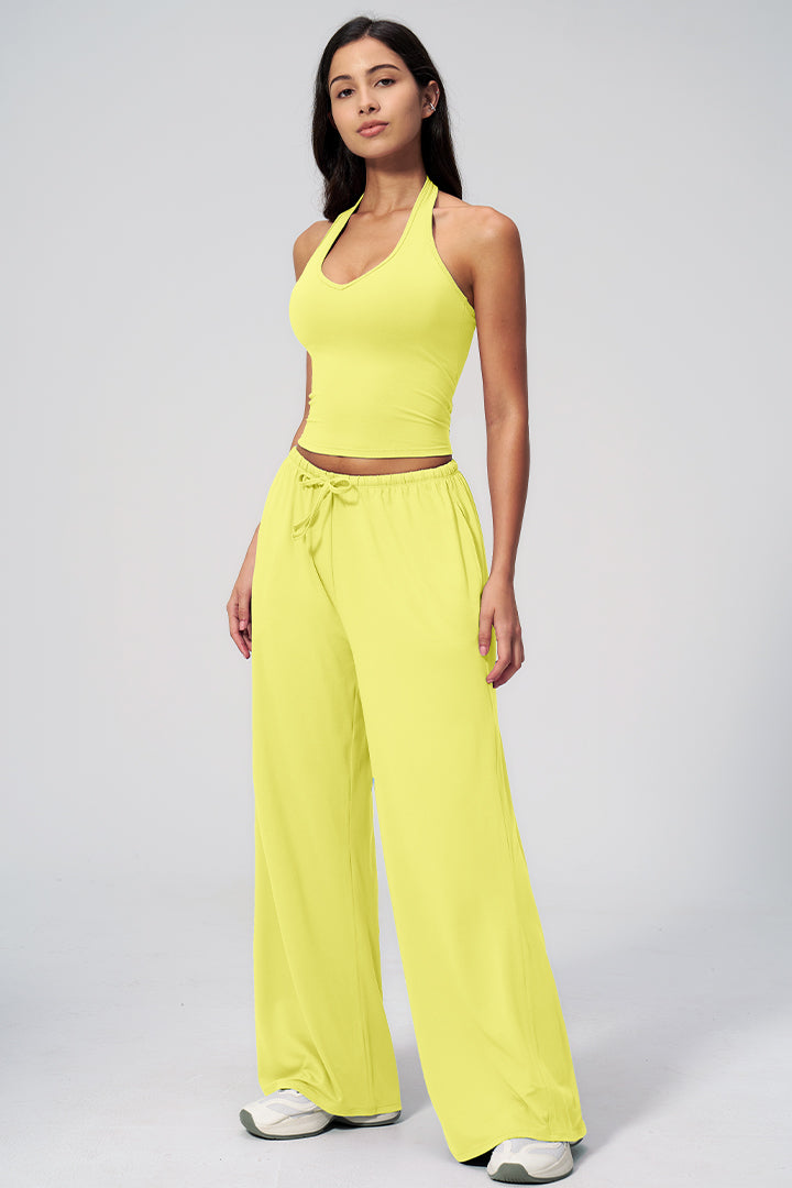Lemon yellow 2-piece athleisure set, sleeveless crop top and flowy wide-leg pants