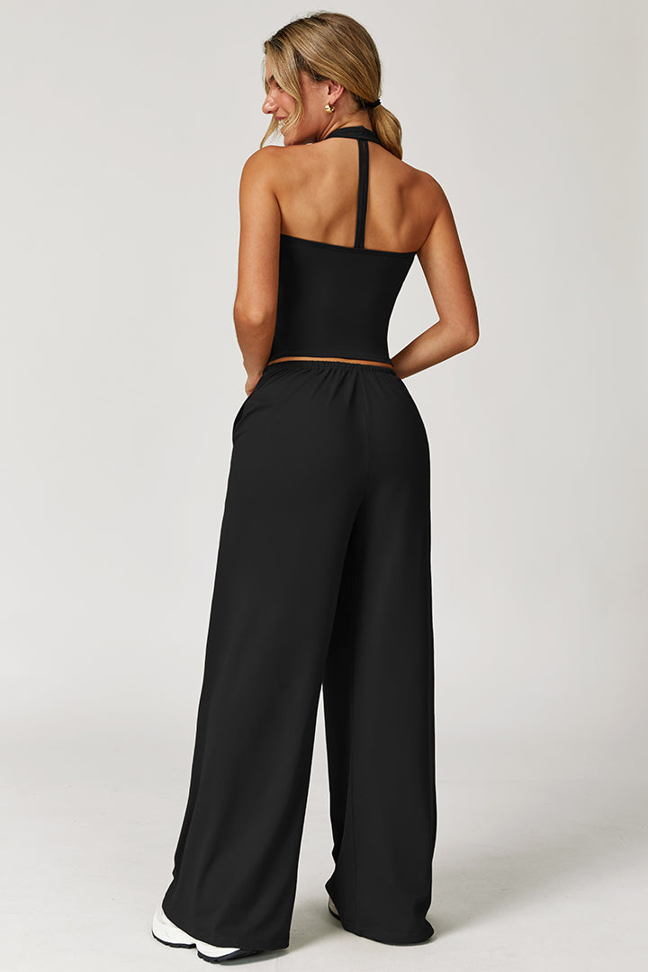 Black 2-piece athleisure set, back view with racerback crop top and wide-leg pants