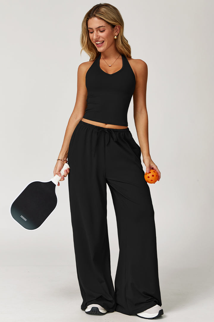Black 2-piece athleisure set, sleeveless crop top and wide-leg drawstring pants