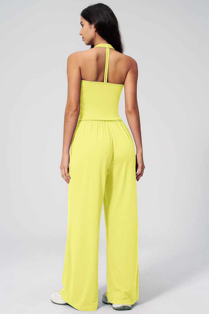 Lemon yellow athleisure set from back view: racerback crop tank with wide-leg pants