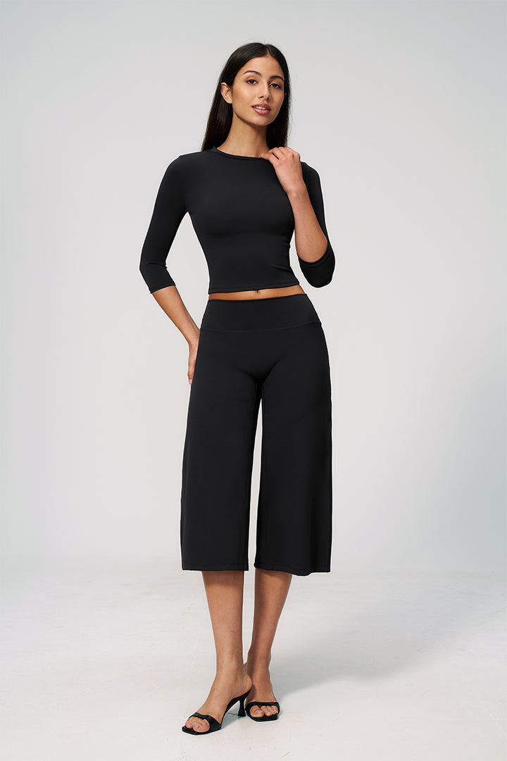 Black 2-piece set with 3/4-sleeve crop top and wide-leg capri pants