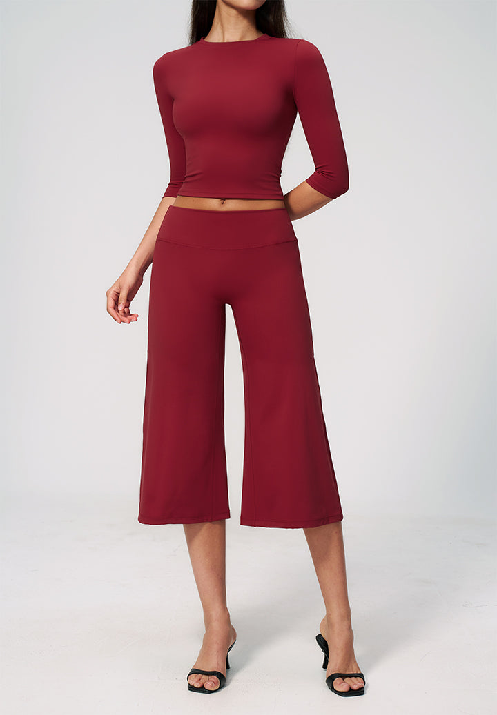 Burgundy long-sleeve crop top with matching wide-leg culottes 2-piece set