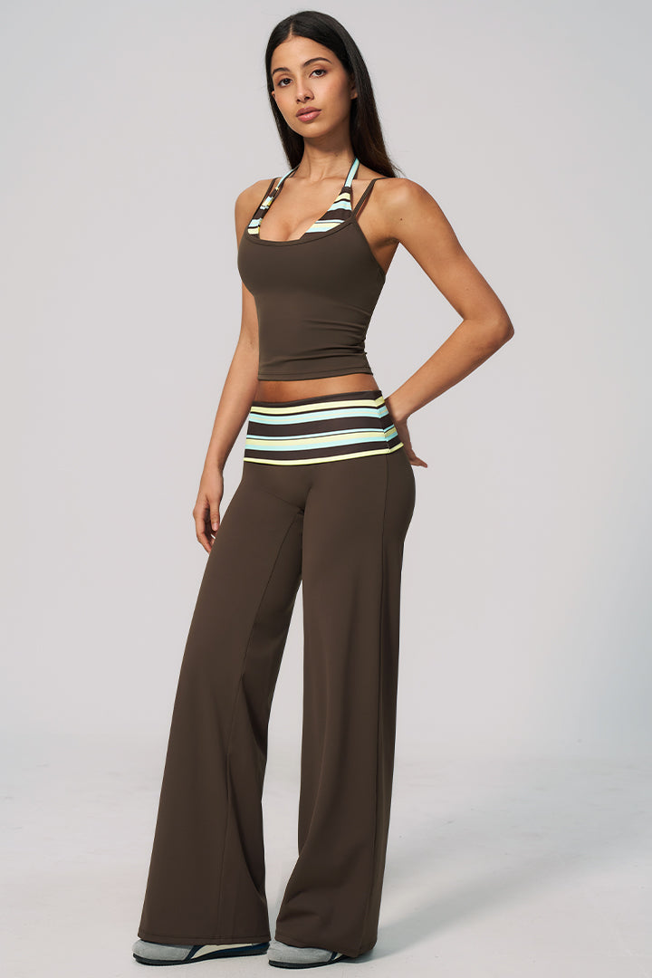 Front view of brown halter top and wide-leg pants set with striped waistband