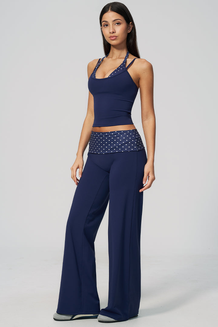 Navy halter top and wide-leg pants set with white polka-dot trim waistband