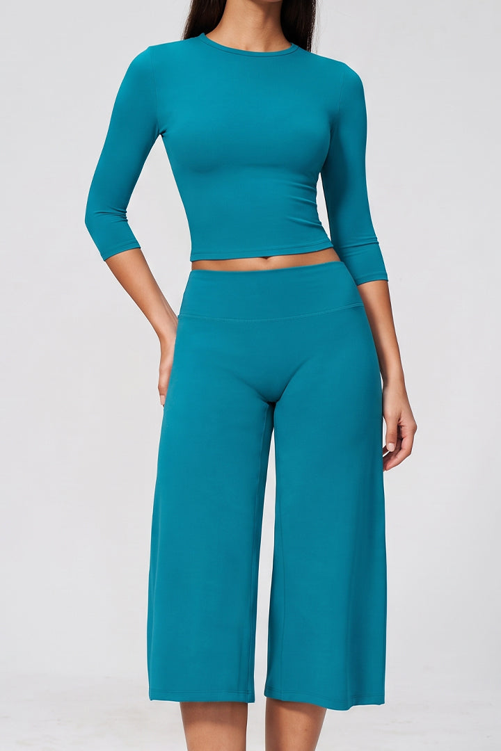Peacock blue long-sleeve crop top and matching wide-leg culotte 2-piece set
