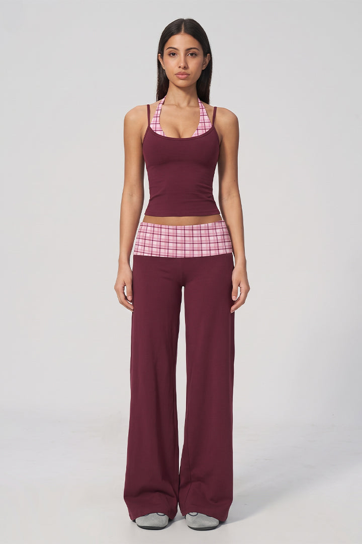Front view: wine halter crop top with pink plaid band and wide-leg pants set