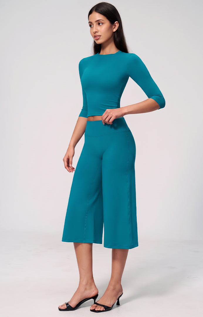 Peacock blue long-sleeve crop top with matching wide-leg culottes 2-piece set