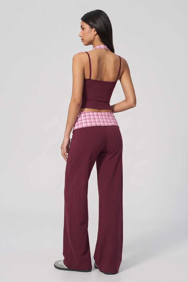 Back view: wine halter crop top with pink plaid waistband and wide-leg pants set